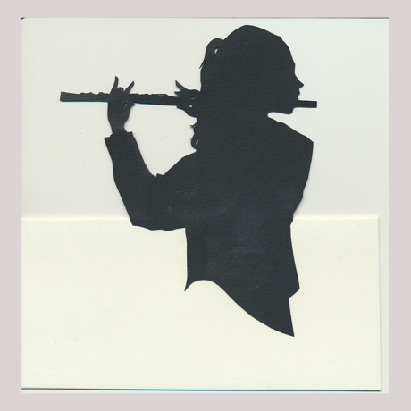 
        Front of silhouette, with girl who is playing a clarinet, half of silhouette is jutting out.